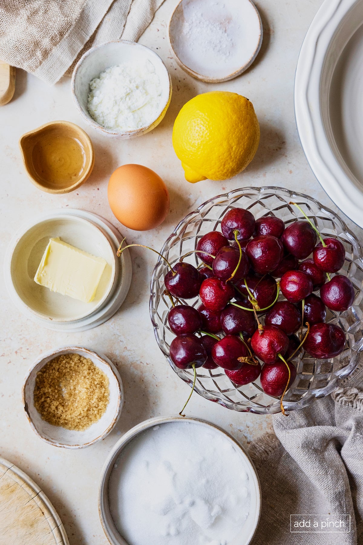 Ingredients used to make homemade cherry pie.