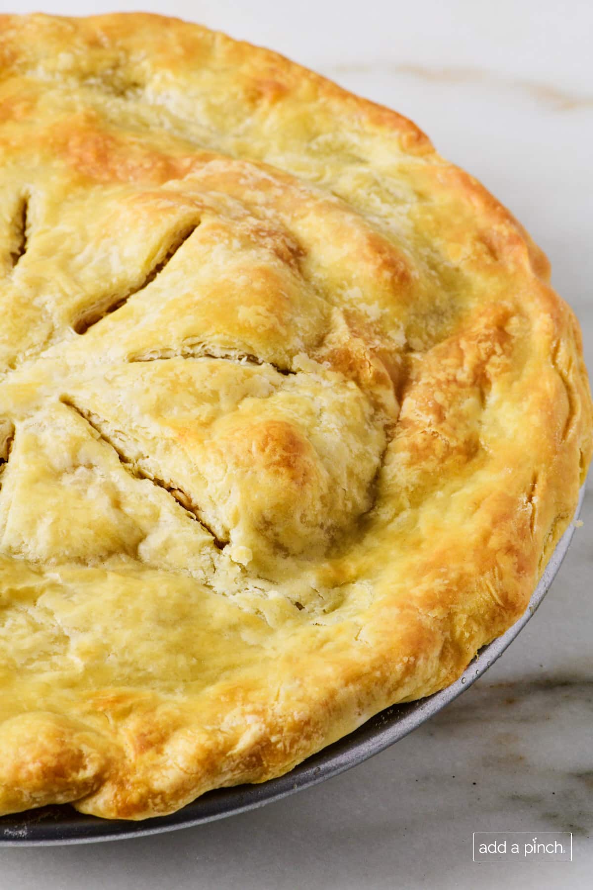 Baked apple pie with top crust.