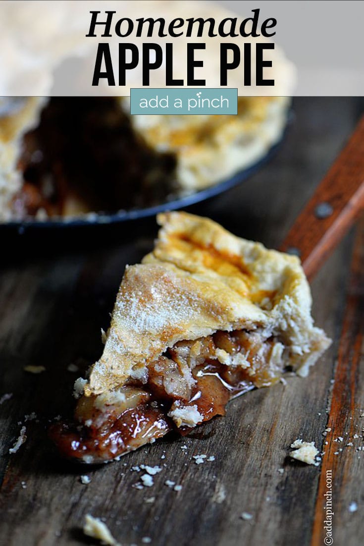 Homemade Apple Pie with slice on pie server on wooden board - with text - addapinch.com