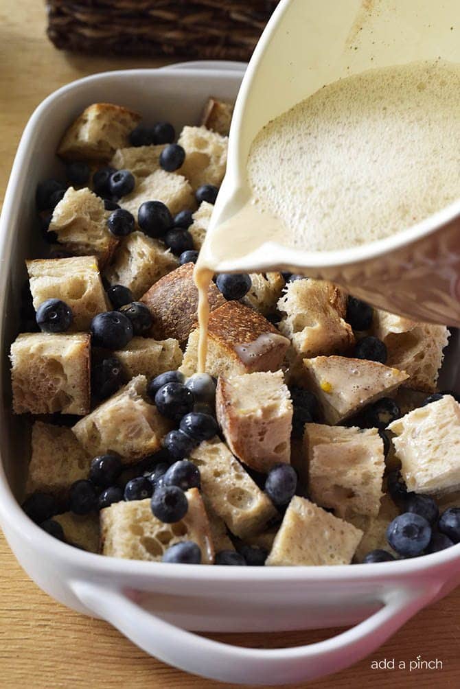 Baked Blueberry French Toast Recipe - This Baked Blueberry French Toast makes a delicious breakfast or brunch recipe! Made with bread, blueberries, maple syrup and topped with a streusel topping, this is always a favorite! // addapinch.com