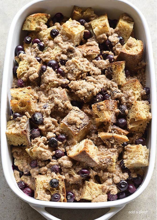 Baked Blueberry French Toast Recipe - This Baked Blueberry French Toast makes a delicious breakfast or brunch recipe! Made with bread, blueberries, maple syrup and topped with a streusel topping, this is always a favorite! // addapinch.com