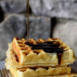 Our Favorite Buttermilk Waffles Recipe - Our favorite buttermilk waffles are crisp on the outside, yet tender and fluffy on the inside. This is the buttermilk waffle recipe I turn to again and again! // addapinch.com