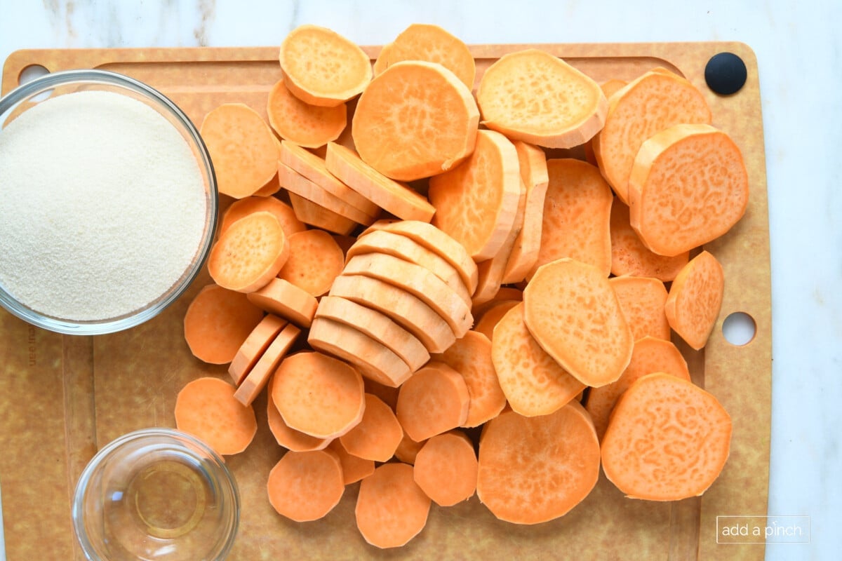 Sliced sweet potatoes and other ingredients ready for candied sweet potatoes.