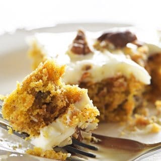 Easy Carrot Cake Sheet Cake Recipe - This Easy Carrot Cake Sheet Cake recipe comes together easily and bakes into a beautiful, delicious carrot cake! Topped with a fluffy cream cheese frosting, this carrot cake is one everyone asks for the recipe! // addapinch.com