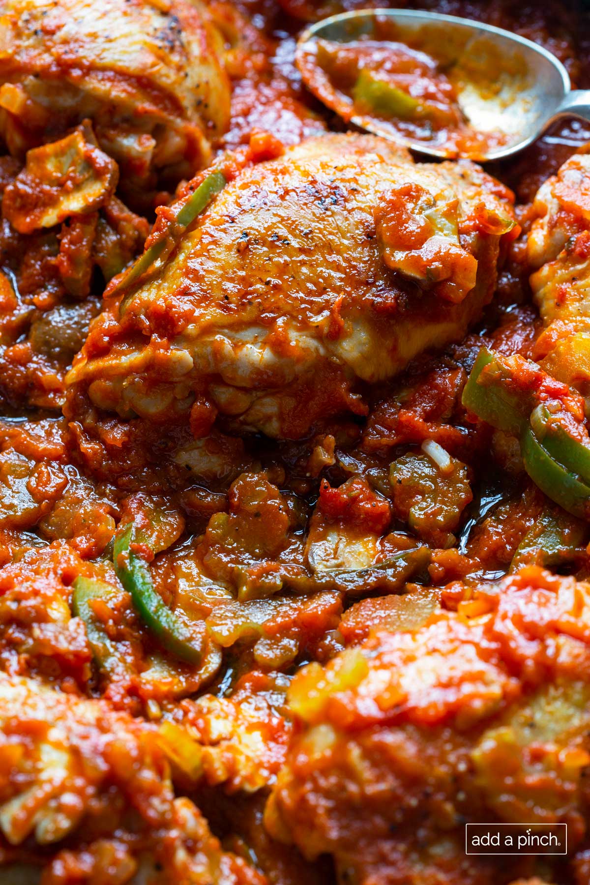 Photo of chicken cacciatore in a skillet.