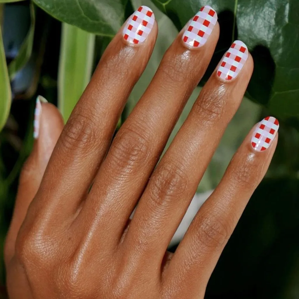 Crosswork red and white picnic blanket manicure