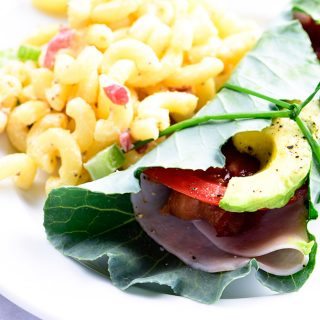 Collard Wrap Recipe - Collard wraps make a fresh, delicious, and nutrient dense way to update your favorite wraps or sandwiches! Made with turkey, bacon, tomato and avocado, these collard wraps are sure to become a favorite! // addapinch.com