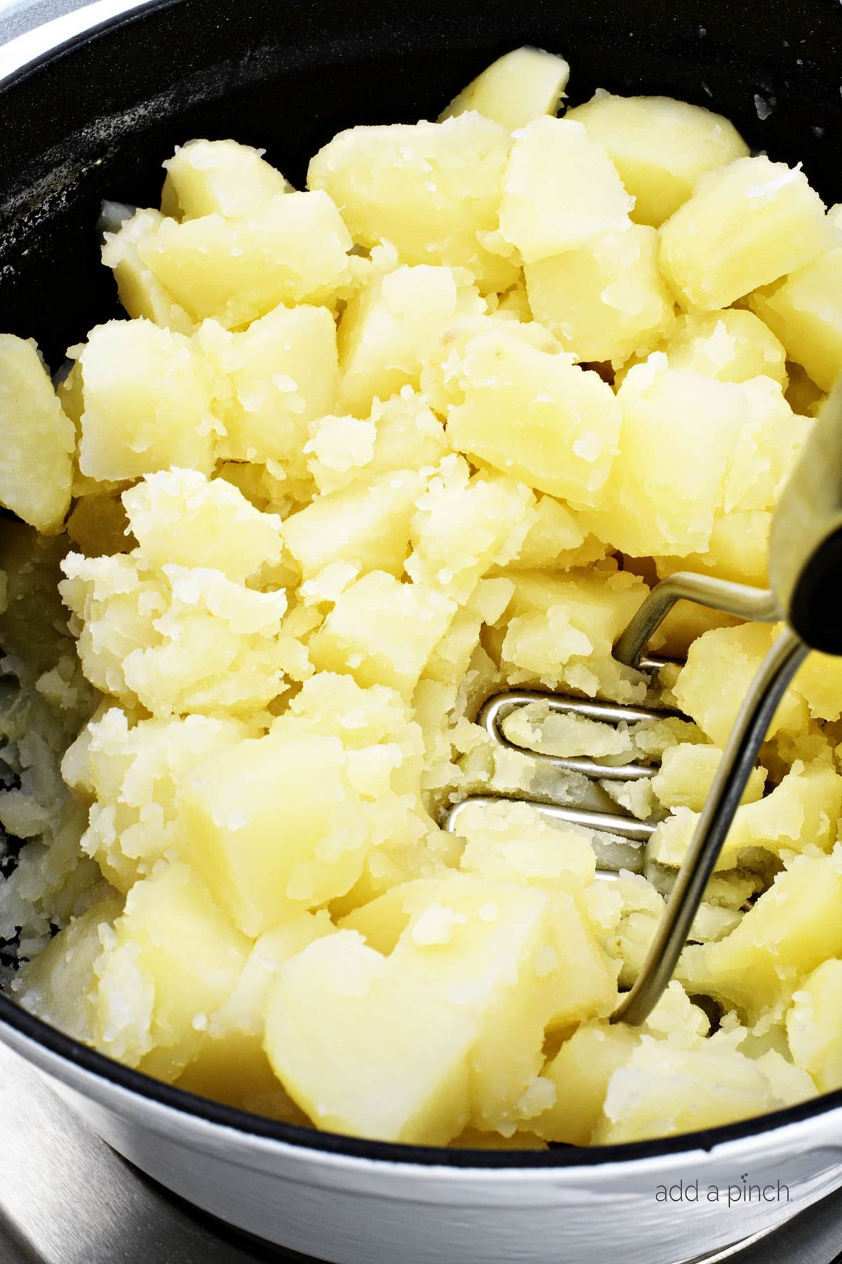 Easy Mashed Potatoes Recipe - These are truly the perfect mashed potatoes! Buttery, creamy, fluffy and absolutely delicious, they are so easy to make and always a family favorite! // addapinch.com