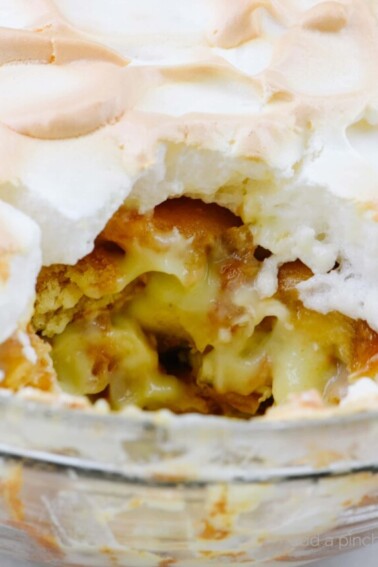 Southern Banana Pudding Recipe - An heirloom family recipe for banana pudding that is a classic, Southern dessert. Creamy, traditional banana pudding topped with airy meringue. // addapinch.com