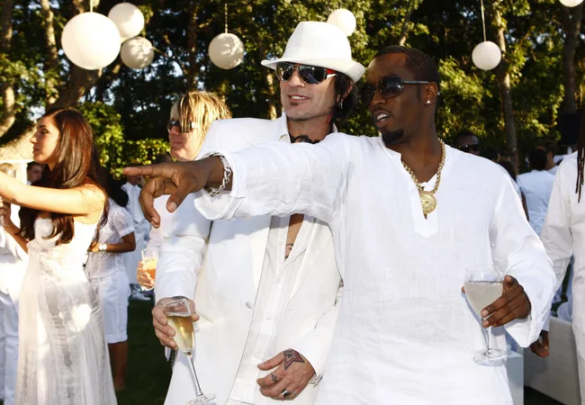 Sean "Diddy" Combs and musician Tommy Lee attend "The Real White Party" presented by Sean "Diddy" Combs at the Combs' East Hampton estate on September 2, 2007