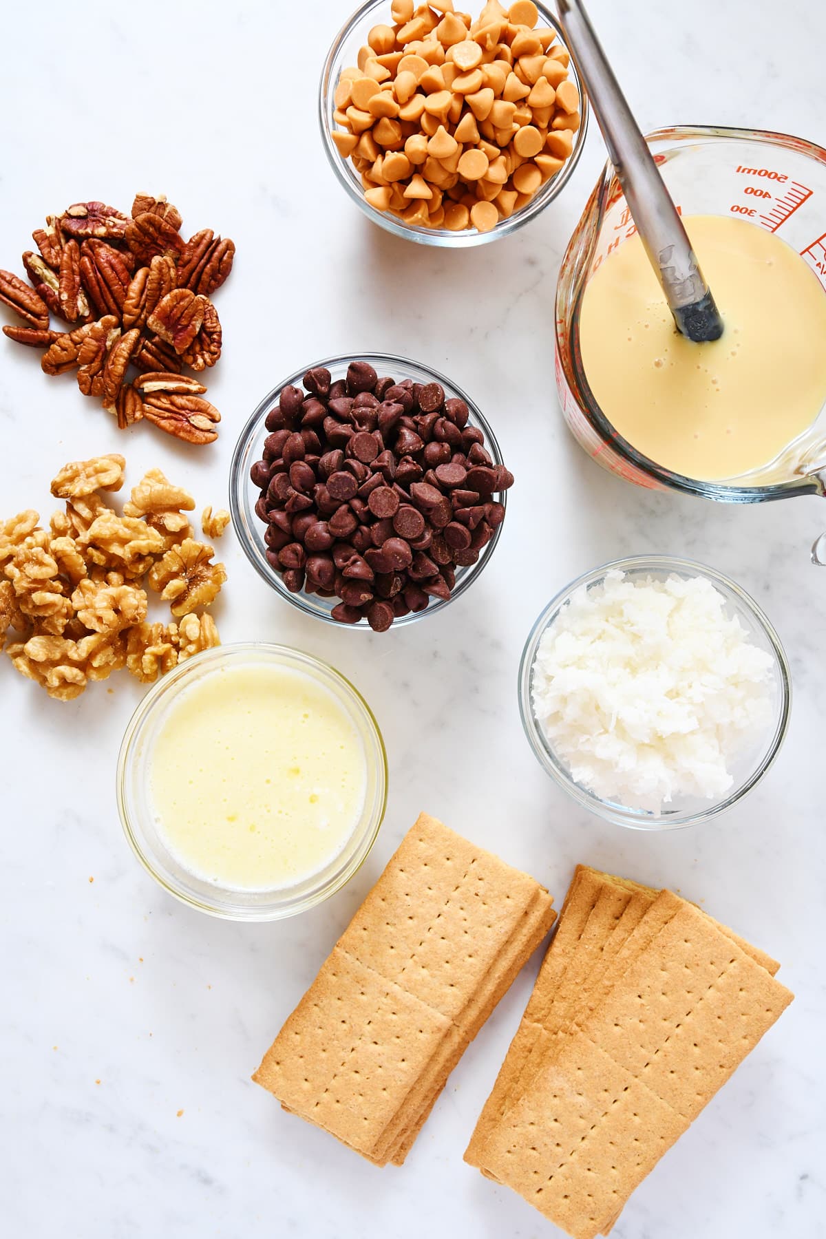 Ingredients used to make Seven Layer Magic Cookie Bars recipe.