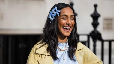 a woman with clips demonstrating the three word method for style