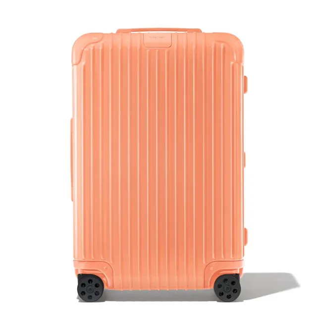 rimowa-papaya-luggage-check-in