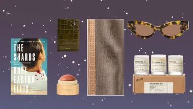 Sagittarius gift ideas including The Shards by Bret Easton Ellis, a Sezane Passport Holder, a Merit Flush Balm blush, a Leleabo Candle Discover set a Loewe Towel and Nanushka sunglasses