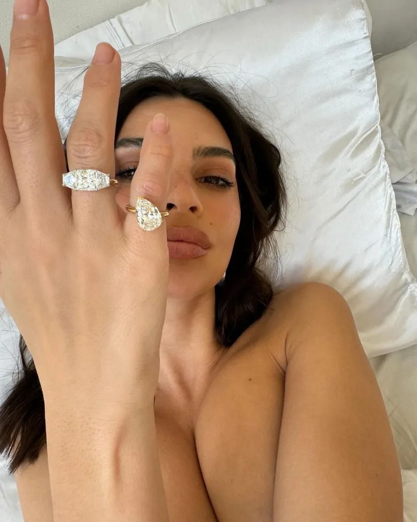 emily ratajkowski showing engagement rings