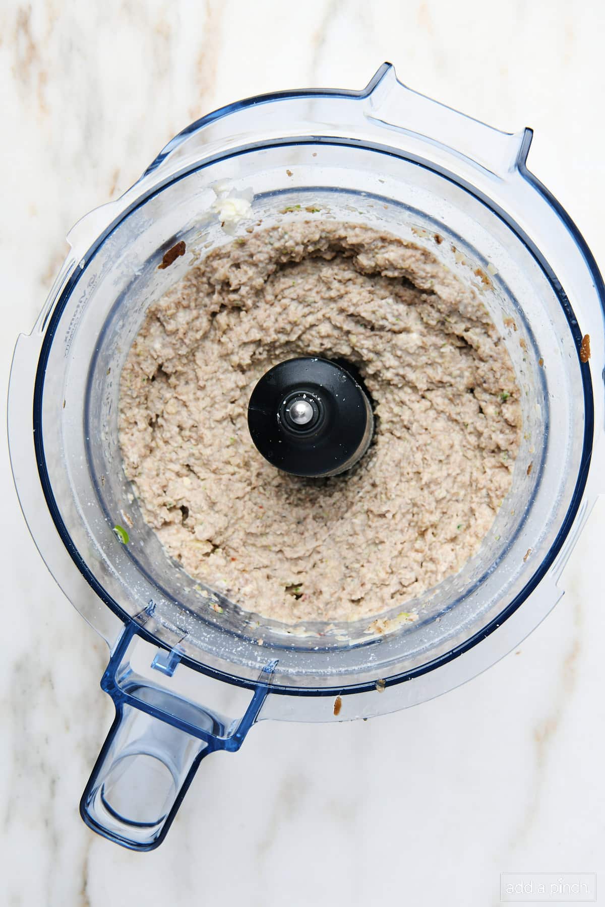 Stuffing mixture has been combined in food processor.