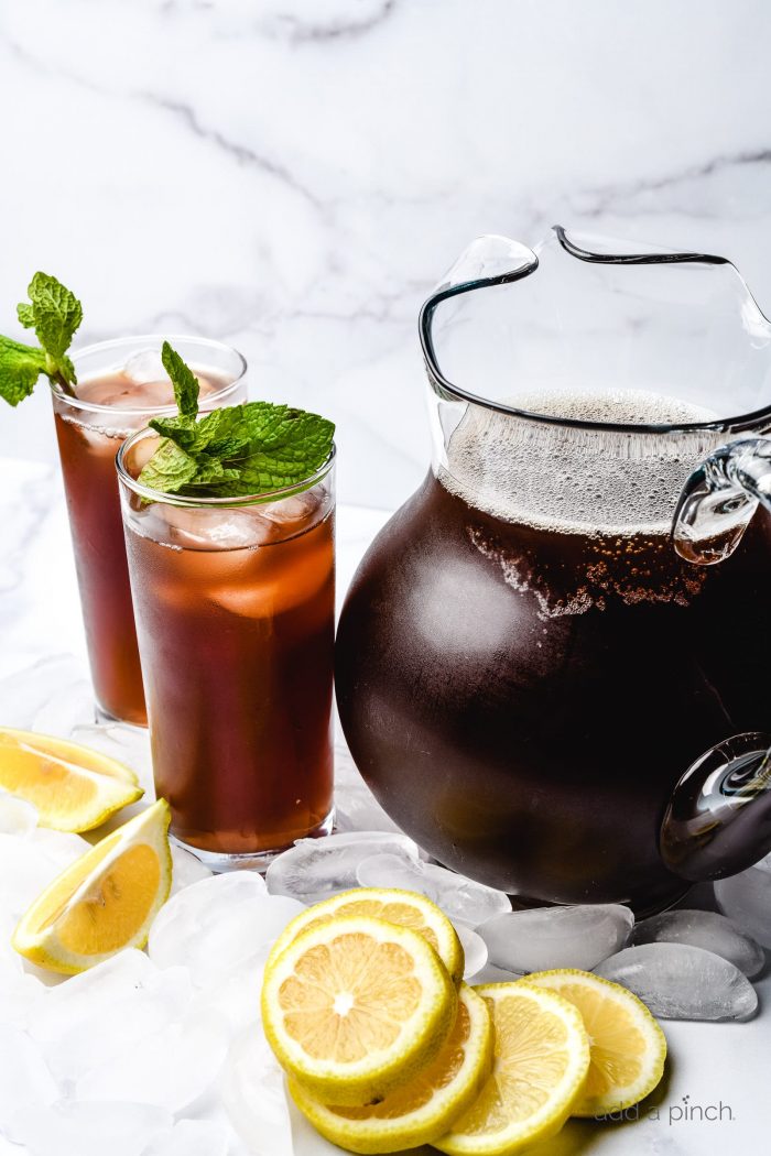 This Southern Sweet Tea recipe is smooth, sweet, and delicious! It includes tried-and-true tips for how to make sweet tea that everyone loves! // addapinch.com