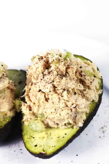 Tuna Salad Recipe - This Tuna Salad recipe makes a delicious, flavorful recipe perfect for lunch or a light supper! Stuffed into an avocado, as a sandwich or served on a lettuce leaf! // addapinch.com