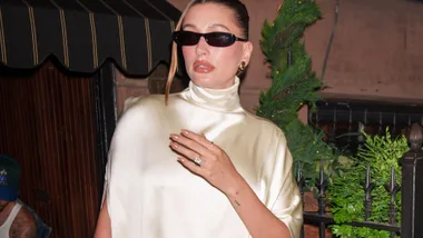 Hailey Bieber is seen on June 23, 2024 in New York City wearing nude chrome nails, one of the hottest winter nail trends.