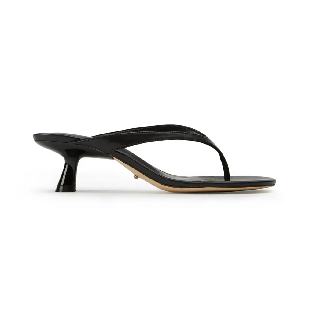 The Tony Bianco Krista Sandal in black features a 2 inch heel, angled heel and padded leather insole with a rounded squared off toe. 